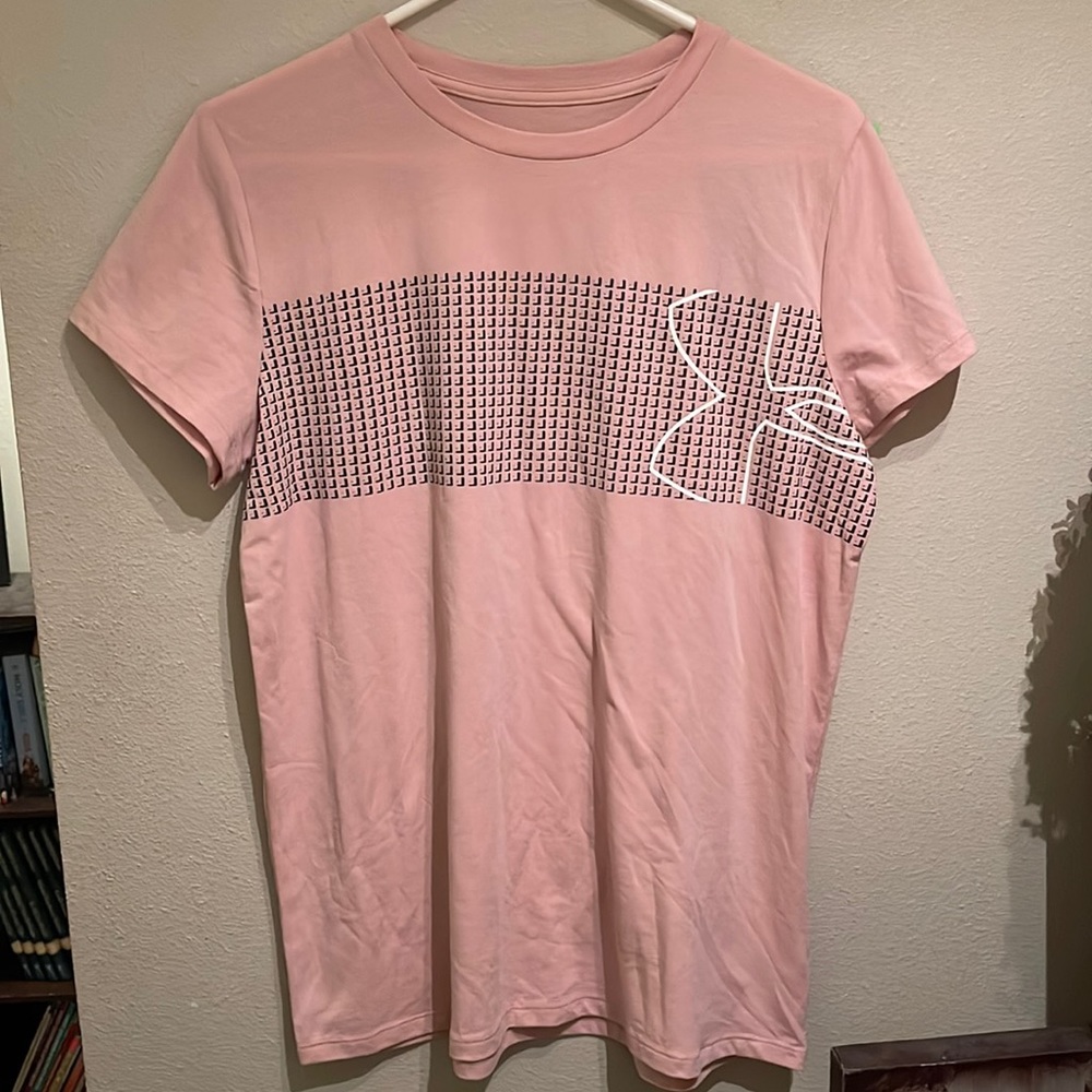 Women’s Pink Under Armour heat gear.